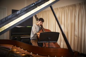 boy playing cello