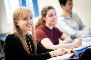 smiling students in class